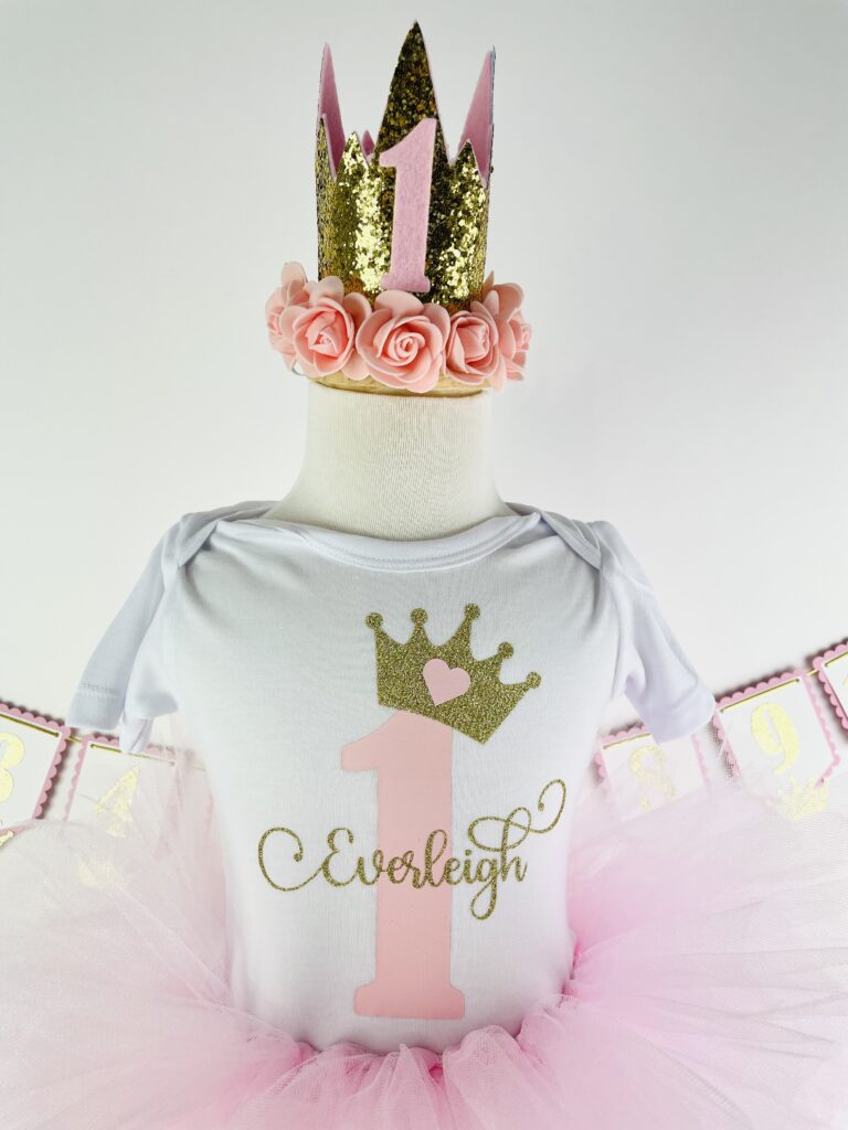 First birthday personalized princess pink tutu with white shirt, pink one, and first name and gold crown